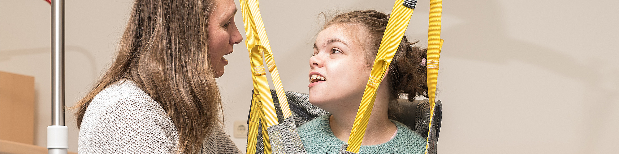 Nurse Transferring Disabled Patient